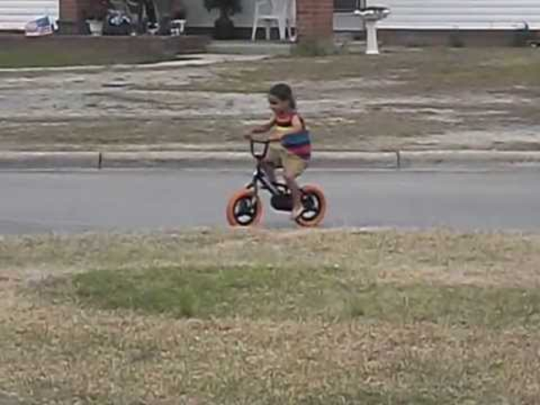 teaching kid to ride bike without training wheels